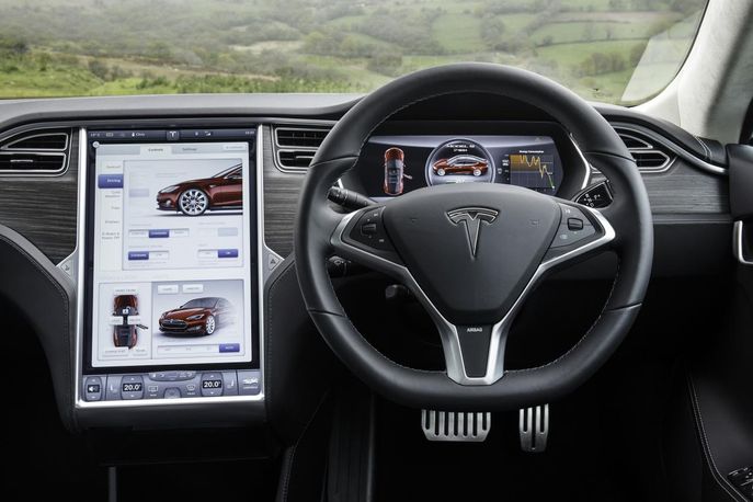 The Tesla S Model software uses a combination of sonar, cameras and a dozen ultrasonic sensors