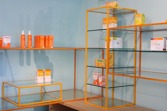 De Los Austrias pharmacy by Stone Designs