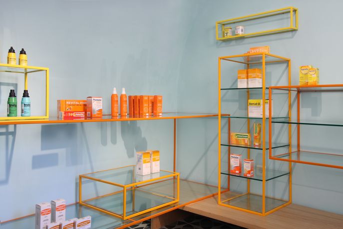 De Los Austrias pharmacy by Stone Designs